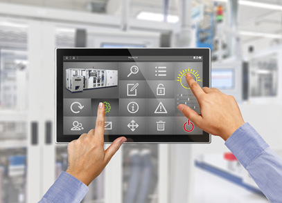 Foto af HMI panel med software knapper der betjenes